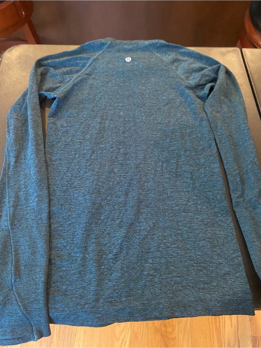 lululemon athletica Woman’s Long Sleeve Heathered Blue Crew. Used good condition